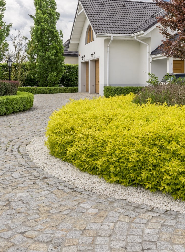 paver-walkway-to-front-door-of-beautiful-house