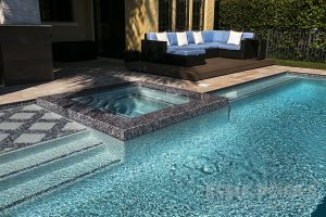 inground spa integrated into pool