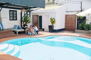 Business people working at pool